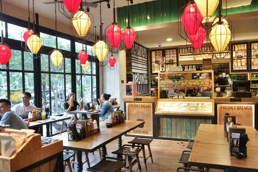 Fast food restaurant interior with customers in Vietnam